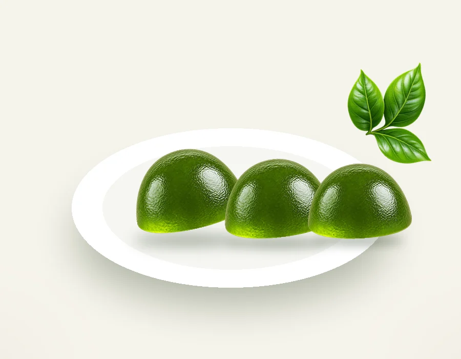 Three gummies on a small white plate